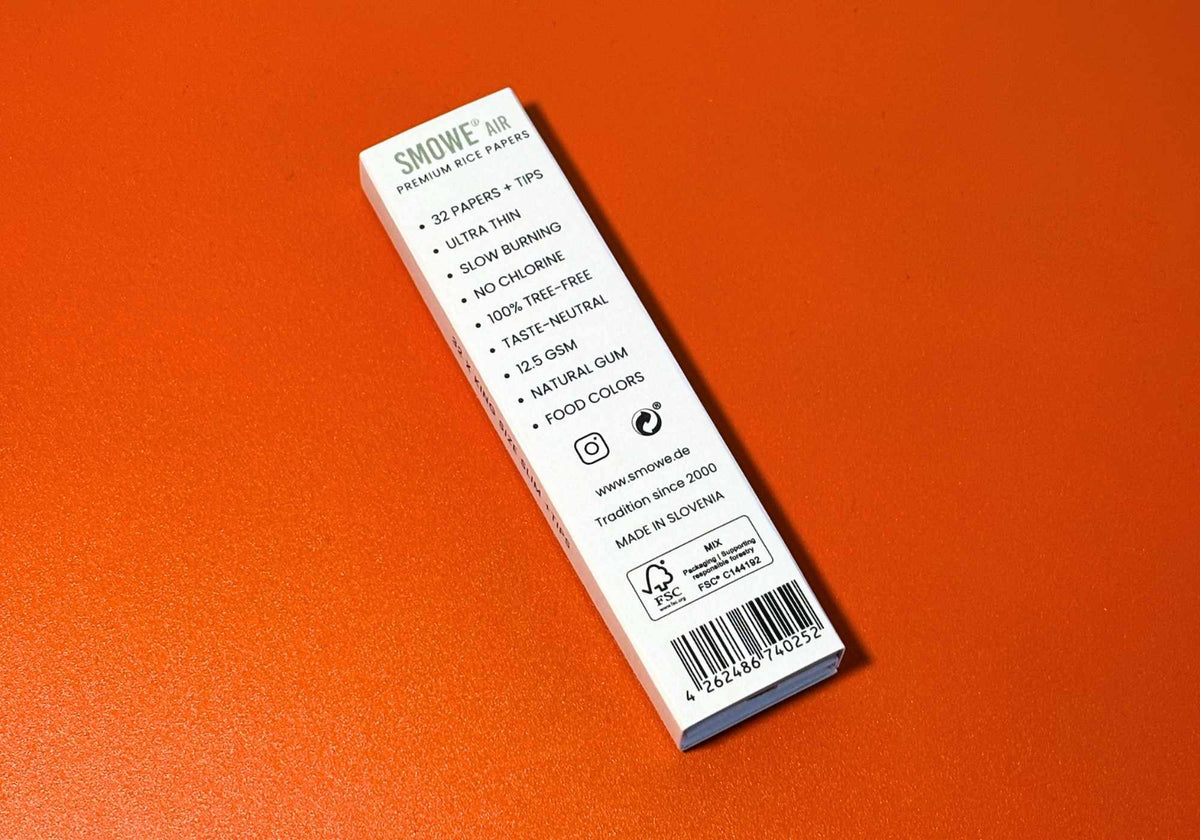 Geschmacksneutrale SMOWE AIR Reispapier Longpapers mit Filter-Tips auf orangefarbenem Hintergrund.